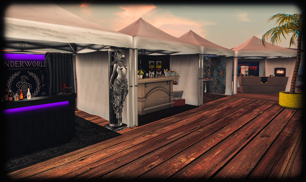 A line of vendor booths prepared for Crackchella at Batterie Beach