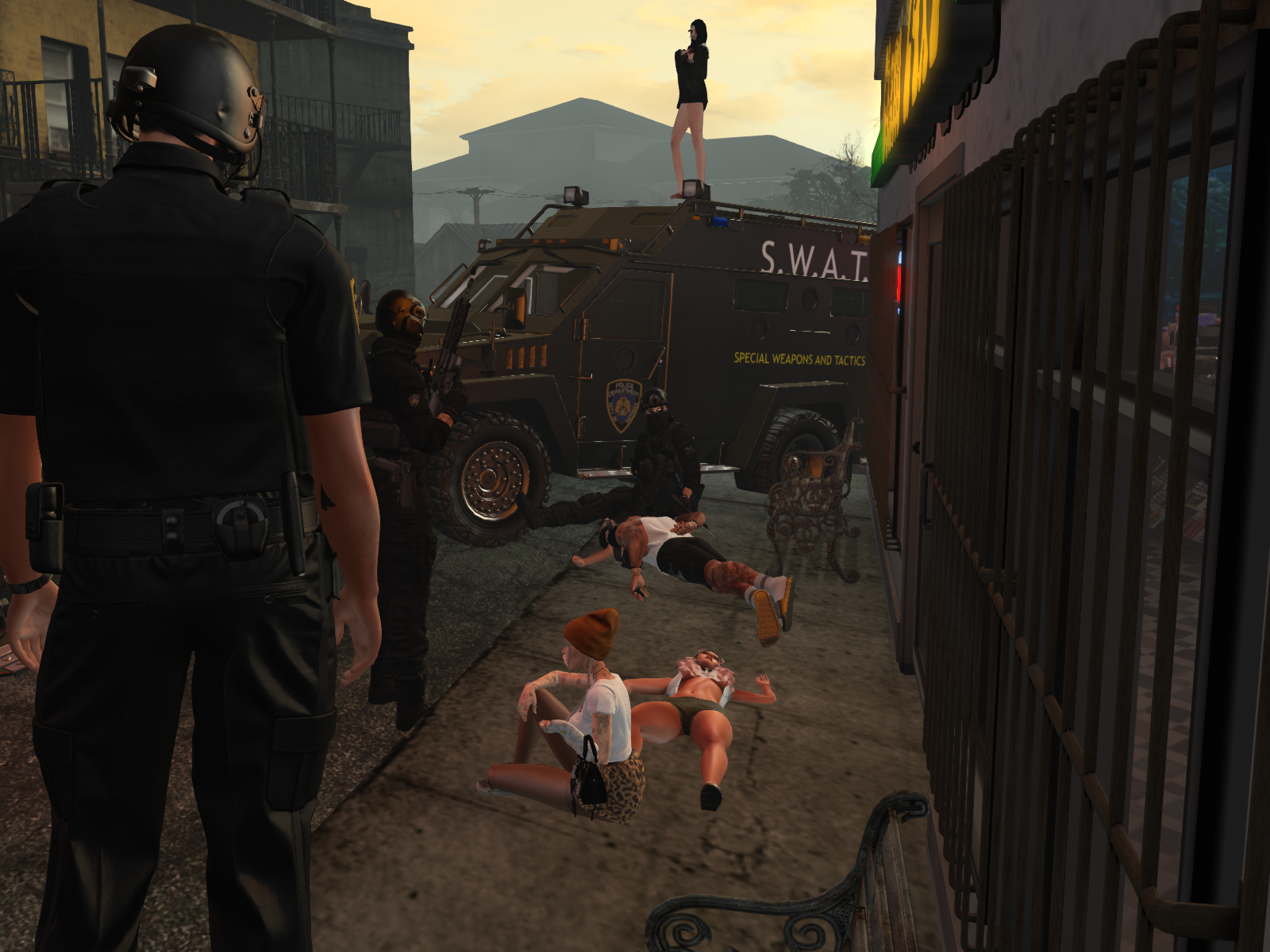 Wounded suspects on the ground beside an HPD SWAT vehicle following the shoot-out at the Clam grocery store