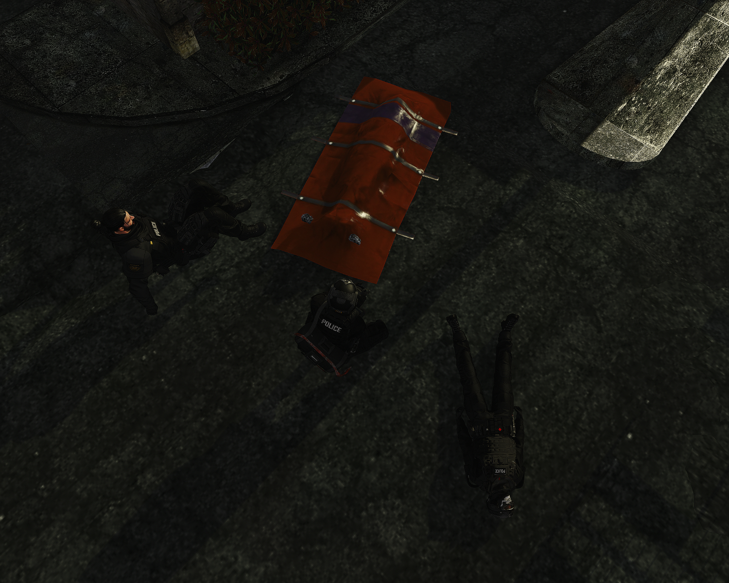 Police and emergency personnel beside a covered body after the raid at Hathian Motors.